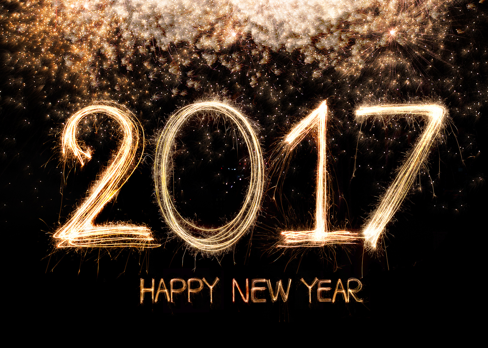 Happy new year 2017 written with Sparkle firework with firework background